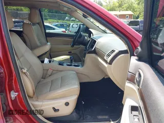 2014 Jeep Grand Cherokee Limited with VIN 1C4RJFBG5EC183810, listed as a IAAI auction lot 42670205 with 151,936 mi miles and . Bid and sale history available at DreamBid. Image 5.
