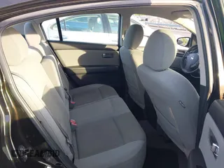 2010 Nissan Sentra 2.0 z VIN 3N1AB6AP1AL698798, wystawiony jako IAAI lot #42188907 z przebiegiem 162 115 mil mil oraz . Historia ofert i sprzedaży dostępna na DreamBid. Obrazek 8.