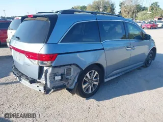 2014 Honda Odyssey Touring with VIN 5FNRL5H98EB102430, listed as a IAAI auction lot 41683822 with 185,802 mi miles. Bid and sale history available at carsss.com. Image 4.
