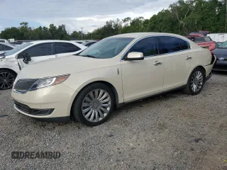2014 Lincoln MKS z VIN 1LNHL9DK7EG600549, wystawiony jako Copart lot #61116835 z przebiegiem 70 000 mil mil oraz Szkoda całkowita • Salvage title. Historia ofert i sprzedaży dostępna na DreamBid. Obrazek 1.