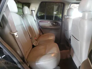 2006 GMC Envoy Denali with VIN 1GKES63M662302685, listed as a Copart auction lot 74315054 with 80,134 mi miles and Salvage Title. Bid and sale history available at carsss.com. Image 10.