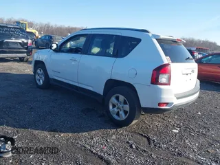 2014 Jeep Compass Altitude with VIN 1C4NJCBA4ED775315, listed as a IAAI auction lot 41429259 with 148,064 mi miles. Bid and sale history available at carsss.com. Image 3.