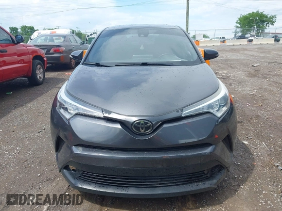 2018 Toyota C-HR XLE with VIN NMTKHMBX6JR021855, listed as a IAAI auction lot 42158449 with 140,945 mi miles and . Bid and sale history available at DreamBid. Image 12.