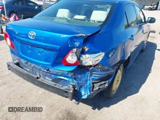 2009 Toyota Corolla with VIN JTDBL40E999021523, listed as a IAAI auction lot 42019856 with 194,011 mi miles. Bid and sale history available at carsss.com. Image 6.