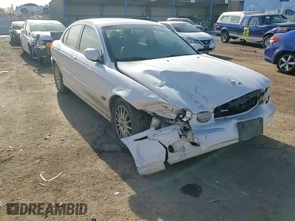 2007 Jaguar X-Type z VIN SAJWA51A07WJ14424, wystawiony jako Copart lot #84556864 z przebiegiem Nie podano mil oraz Szkody całkowita. Historia ofert i sprzedaży dostępna na DreamBid. Obrazek 11.
