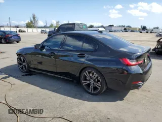 2023 BMW 3 Series 330i with VIN 3MW69FF05P8D21152, listed as a Copart auction lot 48803345 with 21,146 mi miles and Salvage title. Bid and sale history available at DreamBid. Image 2.