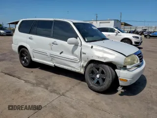 2003 Suzuki XL7 Touring with VIN JS3TY92V334105374, listed as a Copart auction lot 64013375 with 177,939 mi miles and Salvage title. Bid and sale history available at DreamBid. Image 4.