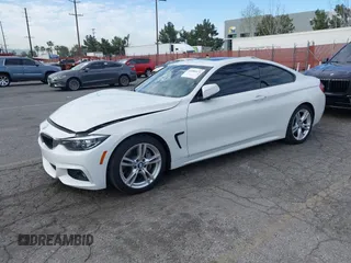 2019 BMW 4 Series 430i with VIN WBA4W3C5XKAF93081, listed as a IAAI auction lot 41689477 with 87,936 mi miles and . Bid and sale history available at DreamBid. Image 2.