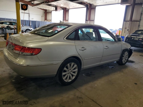 2010 Hyundai Azera GLS with VIN KMHFC4DD7AA473519, listed as a Copart auction lot 71422234 with 120,080 mi miles and Salvage Title. Bid and sale history available at carsss.com. Image 3.