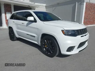 2018 Jeep Grand Cherokee Trackhawk with VIN 1C4RJFN90JC283904, listed as a IAAI auction lot 42757265 with 16,102 mi miles and . Bid and sale history available at DreamBid. Image 1.