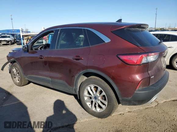 2021 Ford Escape SE with VIN 1FMCU9G67MUA94906, listed as a Copart auction lot 54310725 with 84,595 mi miles and Salvage title. Bid and sale history available at DreamBid. Image 2.