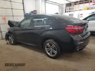 2017 BMW X6 xDrive35i z VIN 5UXKU2C54H0N84719, wystawiony jako Copart lot #55961065 z przebiegiem 56 452 mil mil oraz Szkoda całkowita • Salvage title. Historia ofert i sprzedaży dostępna na DreamBid. Obrazek 2.