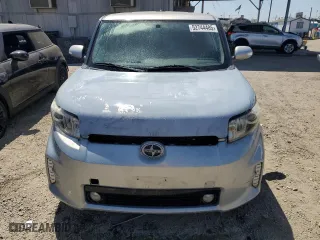 2013 Scion xB with VIN JTLZE4FE5DJ039321, listed as a Copart auction lot 52744485 with 128,536 mi miles and Salvage Title. Bid and sale history available at carsss.com. Image 5.