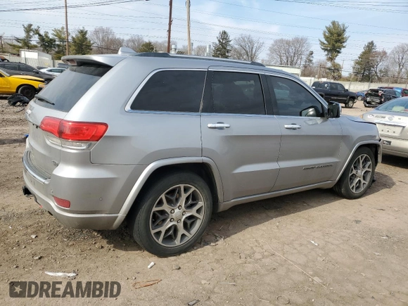 2019 Jeep Grand Cherokee Overland with VIN 1C4RJFCG9KC840084, listed as a Copart auction lot 47440845 with 101,281 mi miles and Salvage Title. Bid and sale history available at carsss.com. Image 3.