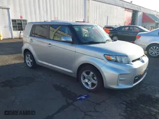 2015 Scion xB with VIN JTLZE4FE7FJ073828, listed as a IAAI auction lot 41857967 with 56,242 mi miles. Bid and sale history available at carsss.com. Image 1.