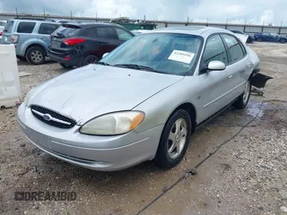 2003 Ford Taurus SES Standard z VIN 1FAFP55S43G270637, wystawiony jako IAAI lot #42205556 z przebiegiem 171 286 mil mil oraz . Historia ofert i sprzedaży dostępna na DreamBid. Obrazek 2.