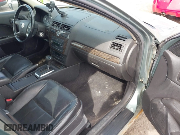 2006 Mercury Milan Premier z VIN 3MEHM08Z16R630899, wystawiony jako IAAI lot #41825986 z przebiegiem 168 042 mil mil oraz . Historia ofert i sprzedaży dostępna na DreamBid. Obrazek 5.