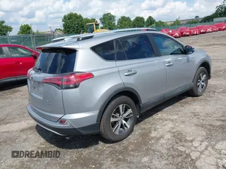 2016 Toyota RAV4 XLE with VIN 2T3RFREV1GW425957, listed as a IAAI auction lot 42648437 with 58,654 mi miles and . Bid and sale history available at DreamBid. Image 4.