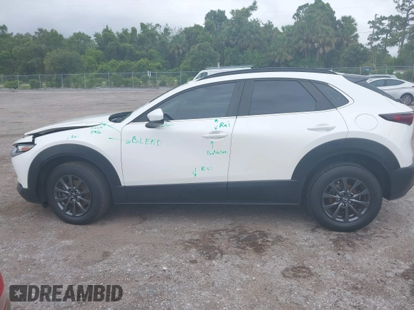 2023 Mazda CX-30 S with VIN 3MVDMBAM1PM511211, listed as a IAAI auction lot 42396707 with 49,469 mi miles and . Bid and sale history available at DreamBid. Image 14.