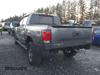 2014 Nissan Titan S with VIN 1N6AA0EC4EN500528, listed as a IAAI auction lot 41323510 with 31,164 mi miles and . Bid and sale history available at DreamBid. Image 3.