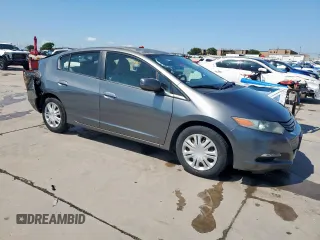 2010 Honda Insight LX with VIN JHMZE2H56AS042097, listed as a Copart auction lot 53972215 with 107,182 mi miles and Salvage Title. Bid and sale history available at DreamBid. Image 4.