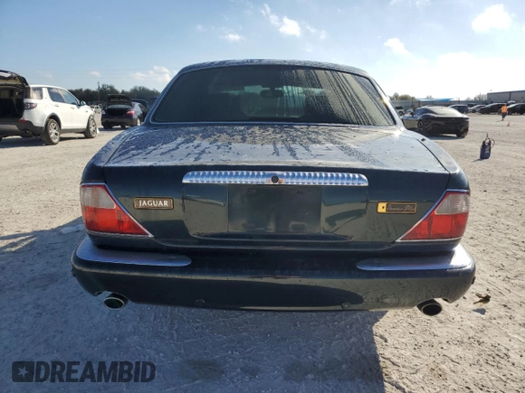 2001 Jaguar XJ Vanden Plas with VIN SAJDA24C51LF38566, listed as a Copart auction lot 43314625 with 100,298 mi miles and Salvage title. Bid and sale history available at DreamBid. Image 6.