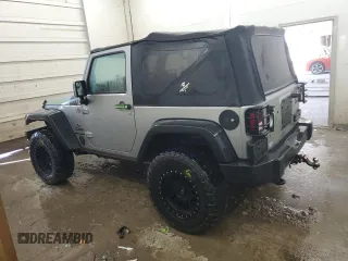 2013 Jeep Wrangler Sport with VIN 1C4AJWAG5DL591897, listed as a Copart auction lot 63218025 with 81,250 mi miles and Clean title. Bid and sale history available at DreamBid. Image 2.
