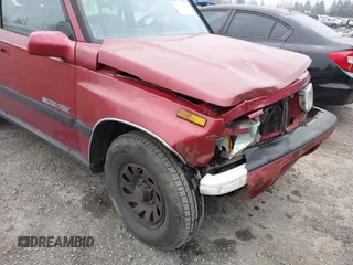 1995 Suzuki Sidekick z VIN JS3TD03V3S4106626, wystawiony jako IAAI lot #41877506 z przebiegiem 166 928 mil mil oraz . Historia ofert i sprzedaży dostępna na DreamBid. Obrazek 6.