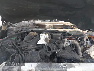 2018 GMC Sierra 2500HD Denali z VIN 1GT12UEY7JF156121, wystawiony jako IAAI lot #42248800 z przebiegiem Nie podano mil oraz . Historia ofert i sprzedaży dostępna na DreamBid. Obrazek 10.