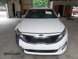 2015 Kia Optima LX z VIN 5XXGM4A72FG488753, wystawiony jako IAAI lot #39163213 z przebiegiem 128 821 mil mil oraz . Historia ofert i sprzedaży dostępna na DreamBid. Obrazek 13.