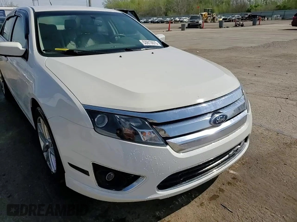 2012 Ford Fusion SEL z VIN 3FAHP0JAXCR220259, wystawiony jako Copart lot #53913975 z przebiegiem 145 424 mil mil oraz Szkoda całkowita • Salvage title. Historia ofert i sprzedaży dostępna na DreamBid. Obrazek 13.