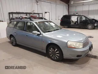 2003 Saturn LW z VIN 1G8JU84F43Y527478, wystawiony jako IAAI lot #42293692 z przebiegiem 146 086 mil mil oraz . Historia ofert i sprzedaży dostępna na DreamBid. Obrazek 1.