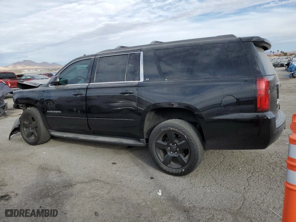 2017 Chevrolet Suburban LT with VIN 1GNSCHKCXHR233937, listed as a Copart auction lot 86526814 with 163,210 mi miles and Salvage Title. Bid and sale history available at carsss.com. Image 2.