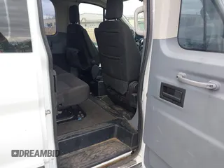 2019 Ford Transit Passenger XL z VIN 1FBZX2ZM7KKA47090, wystawiony jako IAAI lot #41823708 z przebiegiem 236 058 mil mil oraz . Historia ofert i sprzedaży dostępna na DreamBid. Obrazek 8.