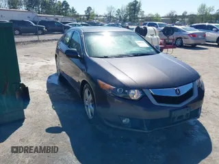 2010 Acura TSX with VIN JH4CU2F63AC003630, listed as a IAAI auction lot 42002216 with 131,244 mi miles. Bid and sale history available at carsss.com. Image 1.