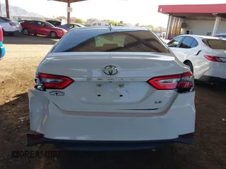 2020 Toyota Camry LE with VIN 4T1C11AK7LU401666, listed as a IAAI auction lot 41865235 with 69,189 mi miles. Bid and sale history available at carsss.com. Image 16.