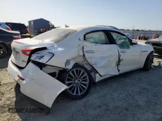 2017 Maserati Ghibli z VIN ZAM57XSAXH1248791, wystawiony jako Copart lot #55975084 z przebiegiem 80 926 mil mil oraz Czysty tytuł • Clean title. Historia ofert i sprzedaży dostępna na DreamBid. Obrazek 3.