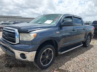 2010 Toyota Tundra 4WD Truck with VIN 5TFDW5F17AX138480, listed as a IAAI auction lot 41927807 with 157,580 mi miles. Bid and sale history available at carsss.com. Image 2.