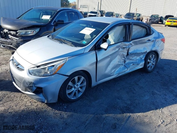 2014 Hyundai Accent GLS with VIN KMHCU4AE3EU603930, listed as a IAAI auction lot 41748640 with 269,813 mi miles. Bid and sale history available at carsss.com. Image 2.