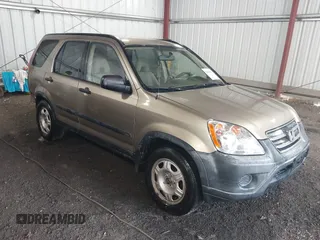 2005 Honda CR-V LX with VIN JHLRD68565C001659, listed as a IAAI auction lot 42162314 with 155,212 mi miles and . Bid and sale history available at carsss.com. Image 1.
