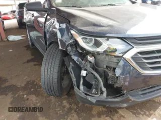 2019 Chevrolet Equinox LS z VIN 3GNAXHEV8KL190100, wystawiony jako IAAI lot #41725409 z przebiegiem 36 175 mil mil oraz . Historia ofert i sprzedaży dostępna na DreamBid. Obrazek 6.