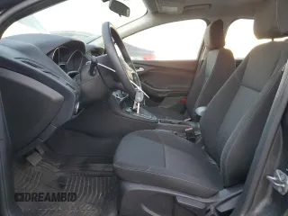2017 Ford Focus SE z VIN 1FADP3F25HL331714, wystawiony jako Copart lot #77389764 z przebiegiem 49 953 mil mil oraz Szkoda całkowita • Salvage title. Historia ofert i sprzedaży dostępna na DreamBid. Obrazek 7.