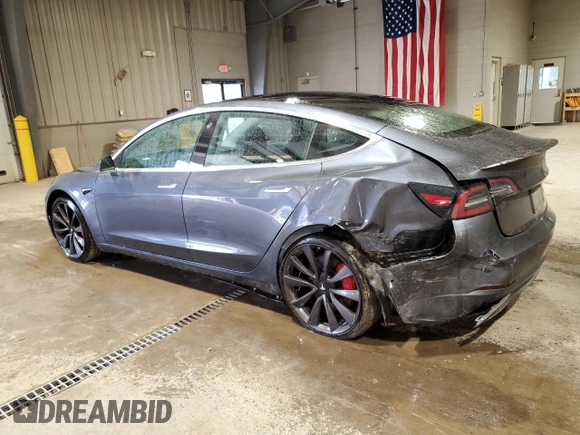 2020 Tesla Model 3 Performance z VIN 5YJ3E1EC8LF640891, wystawiony jako Copart lot #52377615 z przebiegiem 77 343 mil mil oraz Szkoda całkowita • Salvage title. Historia ofert i sprzedaży dostępna na DreamBid. Obrazek 2.
