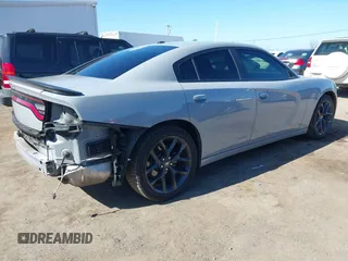 2022 Dodge Charger SXT with VIN 2C3CDXBG3NH231325, listed as a IAAI auction lot 41667810 with 74,967 mi miles and . Bid and sale history available at DreamBid. Image 4.