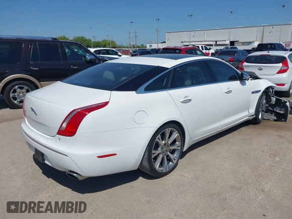 2012 Jaguar XJ XJL with VIN SAJWA2GB3CLV38500, listed as a IAAI auction lot 41990409 with 73,793 mi miles and . Bid and sale history available at DreamBid. Image 4.