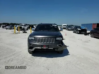 2014 Jeep Grand Cherokee Summit with VIN 1C4RJFJGXEC159438, listed as a Copart auction lot 50864595 with 134,558 mi miles and Salvage title. Bid and sale history available at DreamBid. Image 12.