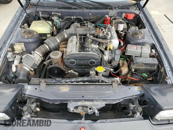 1985 Toyota Supra с VIN JT2MA67L3F0151708, выставлен на аукционе Copart как лот 74672844 с пробегом 60 346 миль миль и Списание • Salvage title. История ставок и продаж доступна на DreamBid. Изображение 11.