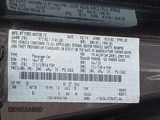 2014 Ford Focus SE with VIN 1FADP3K28EL280100, listed as a IAAI auction lot 42081971 with 183,379 mi miles. Bid and sale history available at carsss.com. Image 9.