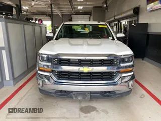 2017 Chevrolet Silverado 1500 LT with VIN 1GCVKREC3HZ172229, listed as a IAAI auction lot 42284142 with 123,647 mi miles and . Bid and sale history available at DreamBid. Image 3.