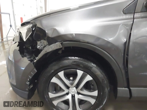 2017 Toyota RAV4 LE with VIN JTMZFREVXHJ111336, listed as a IAAI auction lot 41246935 with 176,693 mi miles and . Bid and sale history available at carsss.com. Image 6.